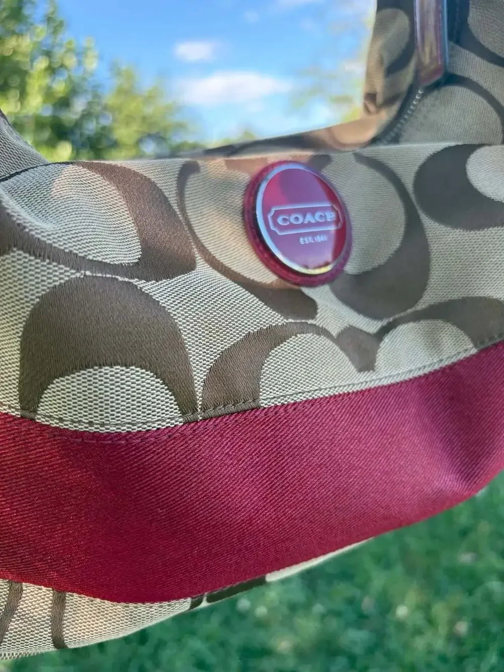 Coach signature stripe hobo bag in burgundy